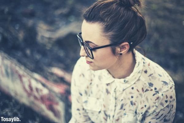 beautiful woman wearing eyeglasses eyewear wearing white blouse with flowers