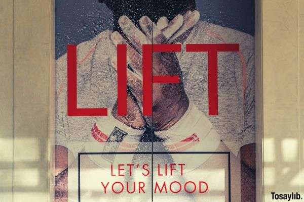 07 man advertisement let s lift your mood poster