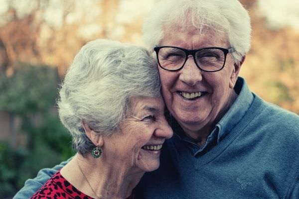 words to describe grandma old couple happy hugging each other