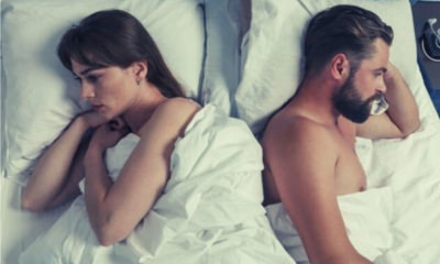 feature-woman-man-quarrel-not-talking-signs-of-partner-cheating-bed