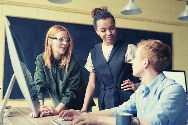 photo of people near computer office ways to say quick learner