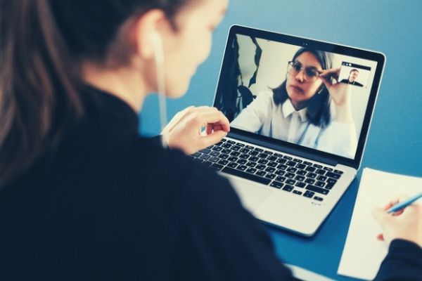 woman on a video call excuse to not video call someone