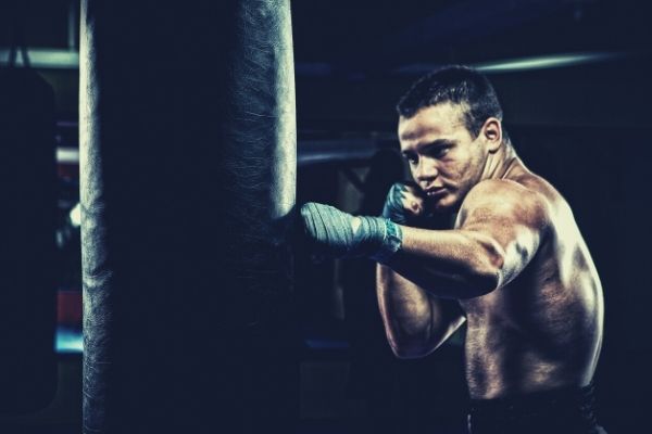 man-boxing-punching-bag-workout