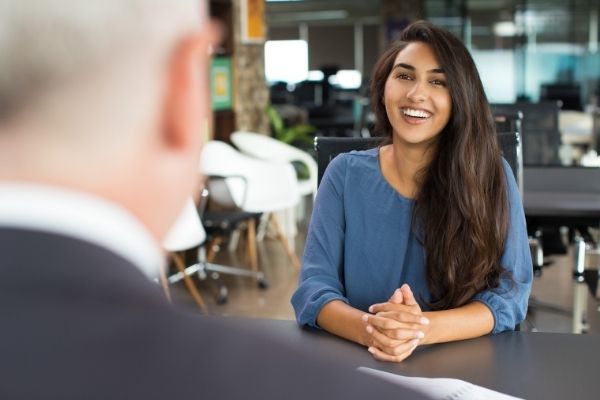 young female candidate laughing job interview