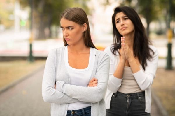 girl begging offended female friend remain