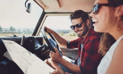 happy-young-couple-map-car-smiling-how-was-your-trip
