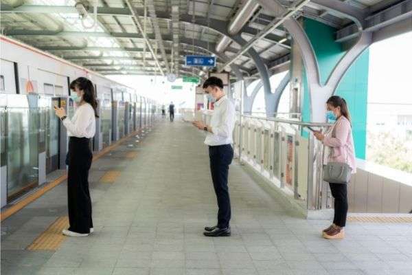 01 three asian people wearing mask social distancing
