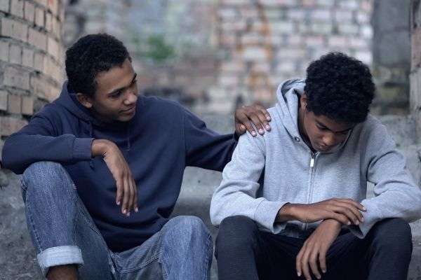 09 afroamerican teenager trying make peace friend