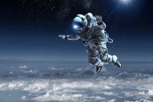 astronaut-floating-above-clouds-words-to-describe-space