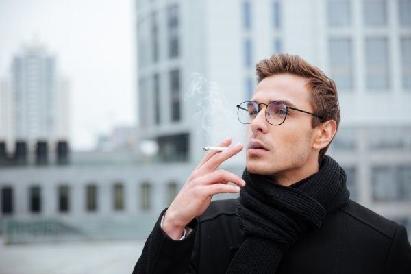 cool business man glasses warm clothes cigarette
