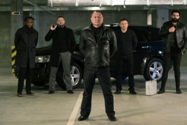 mature mixedrace gangster criminal authority black clothes black car
