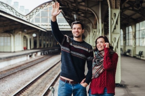 lovely couple being on platform railway
