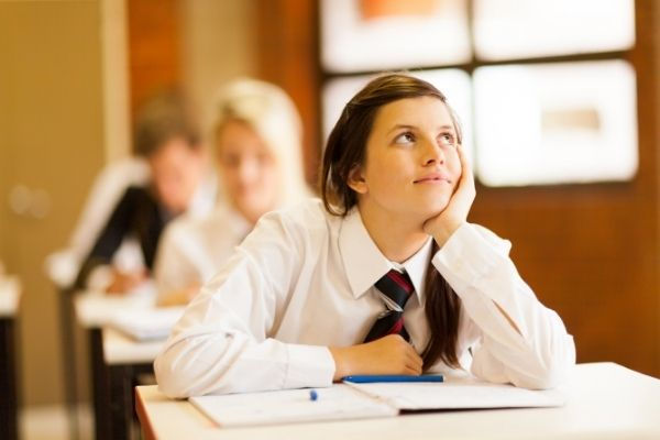 high-school-girl-daydreaming-classroom