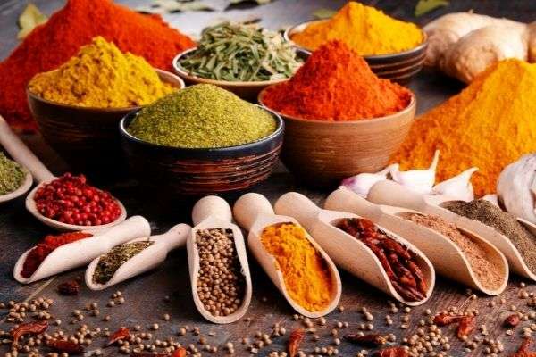 04 variety spices herbs on kitchen table