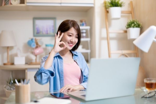 telework concept asian business woman uses laptop