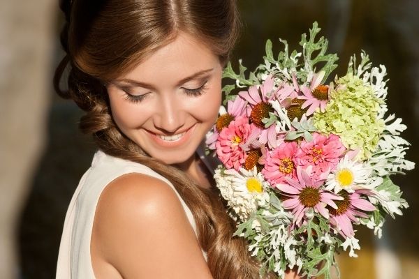 young happy bride flower bouquet