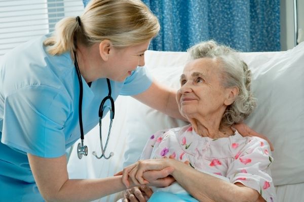 nurse-cares-elderly-woman-lying-bed-thank-you-for-your-service