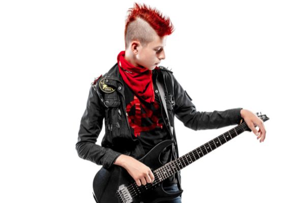 portrait teen boy red haired mohawk guitar
