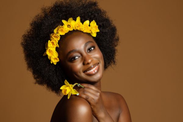 black woman beauty yellow flower african