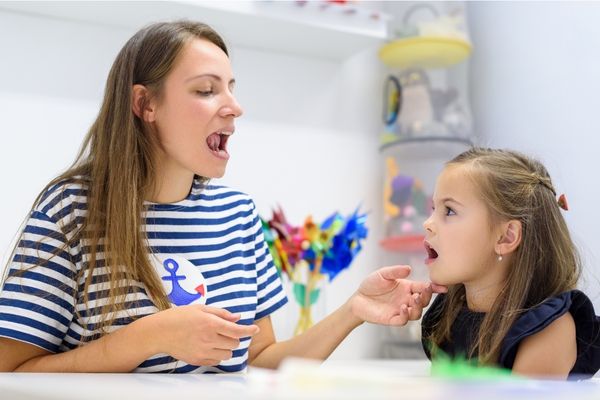 children speech therapy concept preschooler practicing