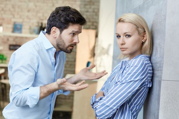 sulky woman explaining man home relationship