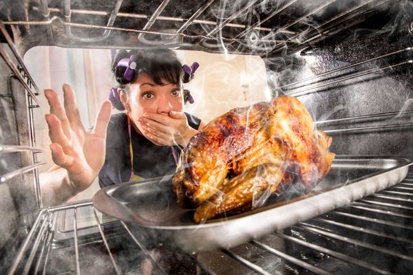 funny housewife overlooked roast chicken oven
