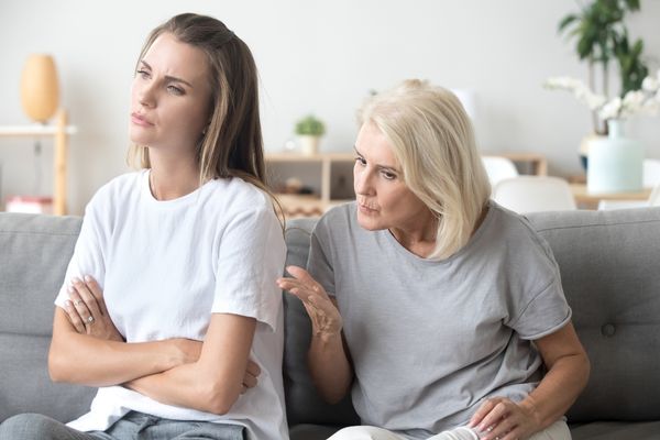 mother talking daughter not listening annoyed