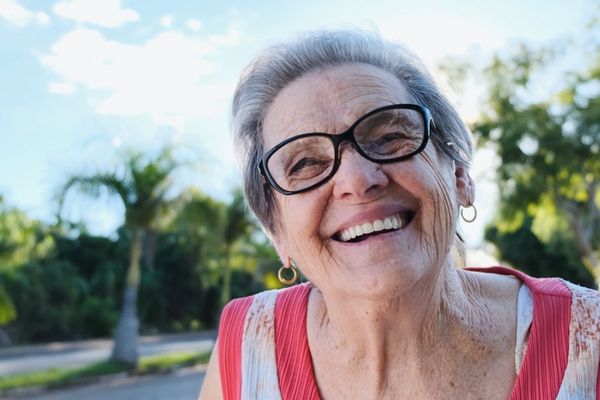 senior woman smiling glasses happy