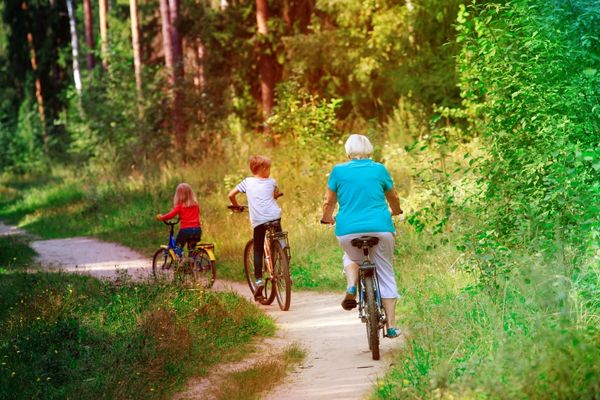 active grandmother kids riding bikes