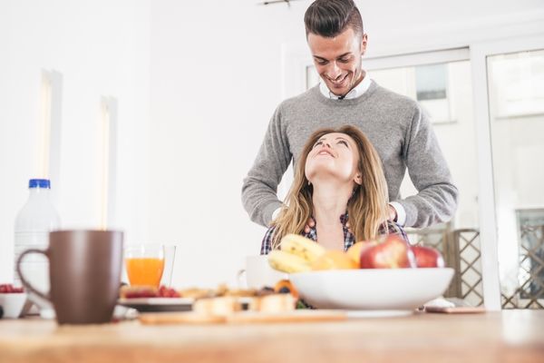 couple sharing love moments breakfast man massaging lady