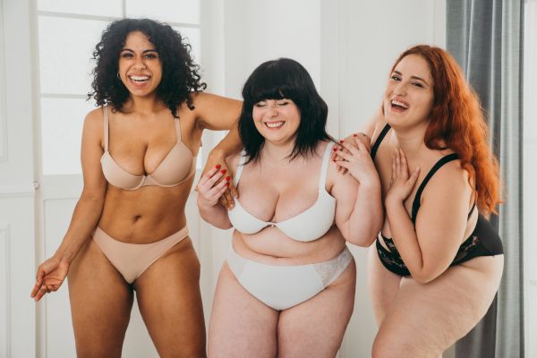 women posing for body positivity and positive lifestyle