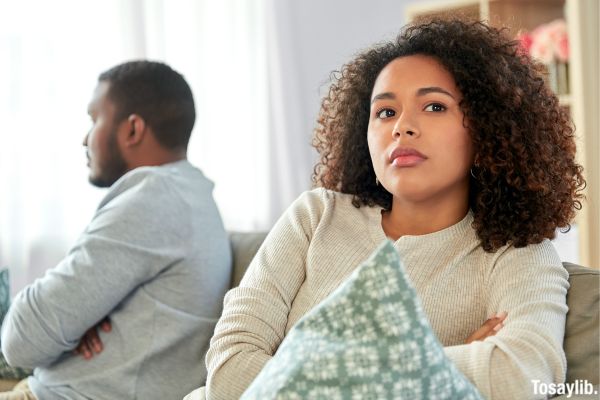 woman upset crying lost heartbroken comforted by a friend