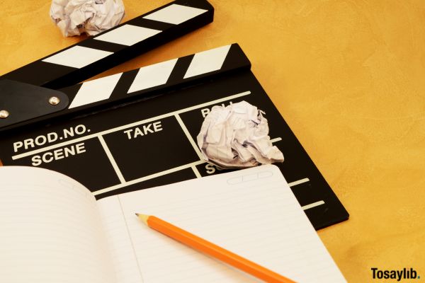 Write a superhero script notebook clapperboard drawing inspirations