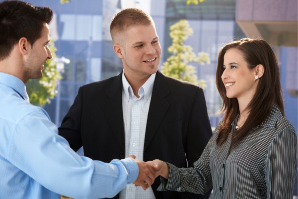 Businesspeople Introducing to new team shaking hands