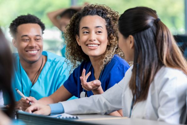 cheerful nurse student talking encouraging