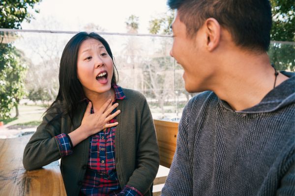 man woman dispute outdoors explaining self defense